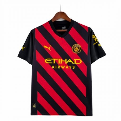 Manchester City FC New Away Kit by Puma 22-23 red and black stripe etihad airways puma